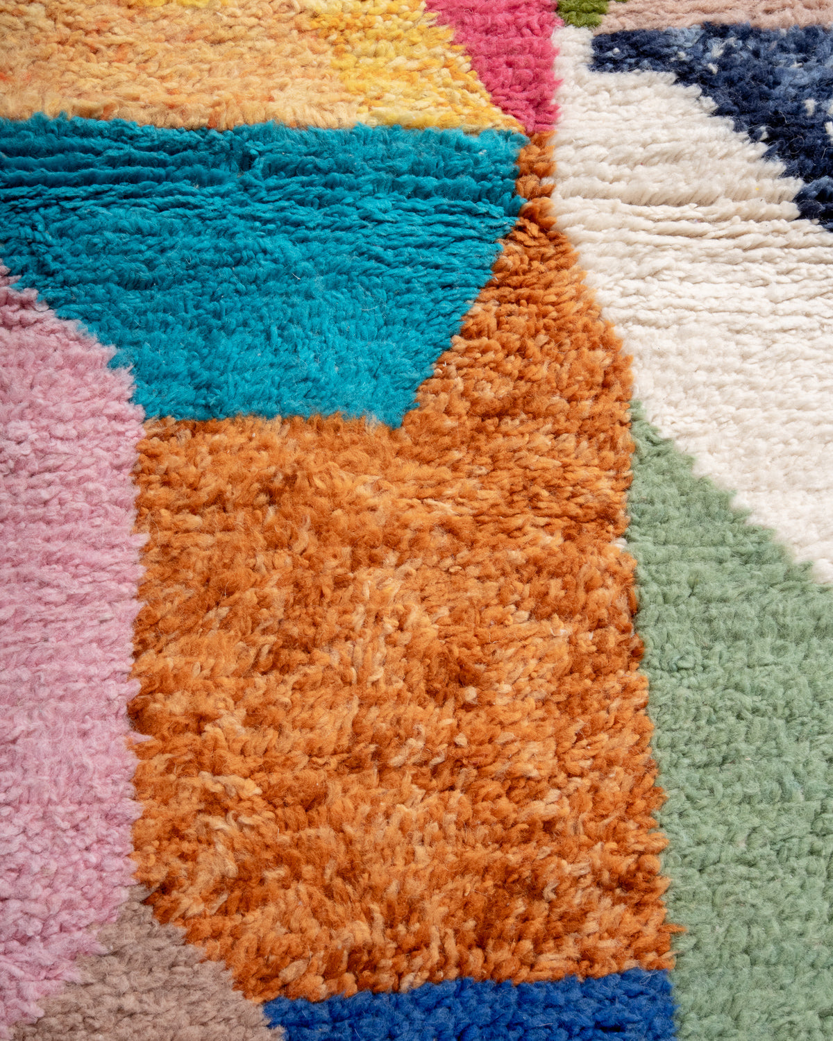Modern, designer, handcrafted Berber rug from Morocco. Beniourain carpet with beautiful colours and patterns and fluffy wool texture.
